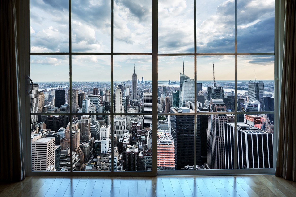 looking out over manhattan real estate from an apartment window